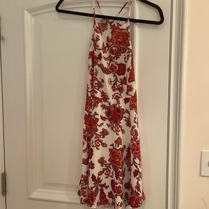 Forever 21 short mini dress with burgundy floral design. Open back
